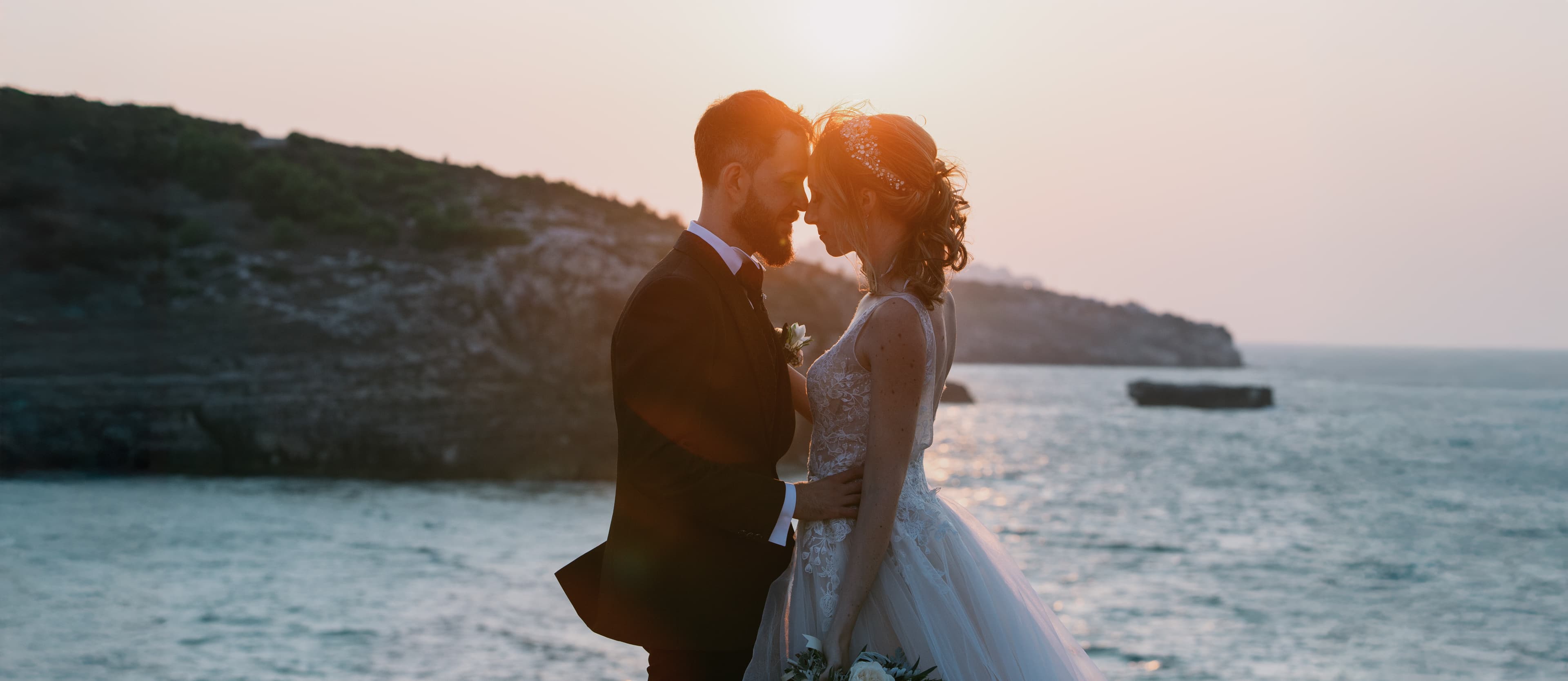 shot of a wedding couple and sunset in gargano national park taken by a puglia wedding photographer